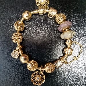 Pandora 14k gold, 7.5" bracelet with charms